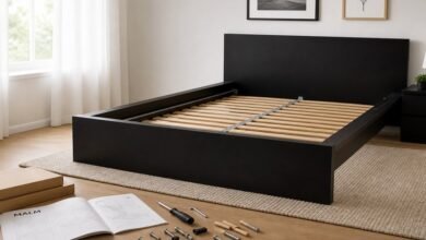 IKEA MALM bed frame assembly in modern bedroom with tools and parts